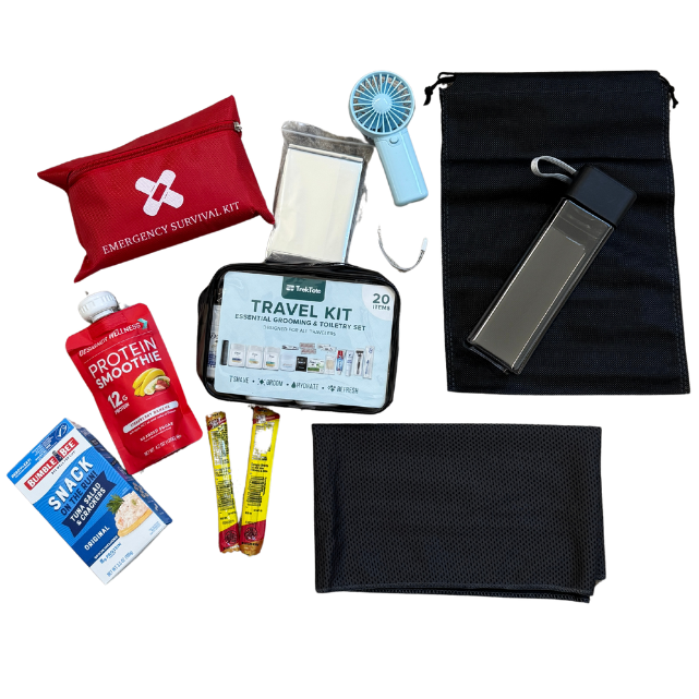 An emergency survival kit laid out on a white background, including a red first aid pouch, a small blue handheld fan, a black drawstring bag with a gray keychain, a black pouch, a travel information card, a tube of OTC medicine, two candy bars, and a small white packet.